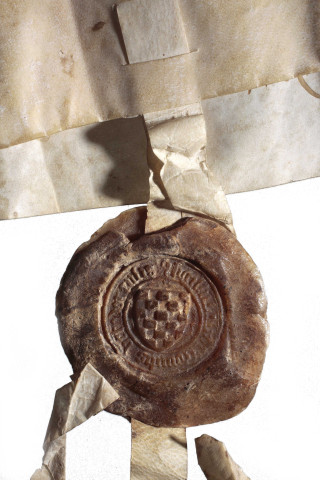 Échange de deux propriétés sises à Meymac entre Antoine Jalinier, barbier, et Jacques Alègre, forgeron, passé devant le commissaire du Comte de Ventadour. Acte sur parchemin. Sceau de cire jaune de Gilbert, Comte de Ventadour, pendant sur double-queue. Meymac, 4 mars 1542
