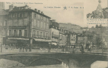 Tulle : "Tulle. Le nouveau pont place Gambetta. La Corrèze illustré. N.6. - La pierre de la Bastille au sommet d'une tour de l'immeuble de la Comédie".