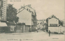 Tulle : "Tulle - Rue nationale. La Corrèze illustré. N.18.". (sic)